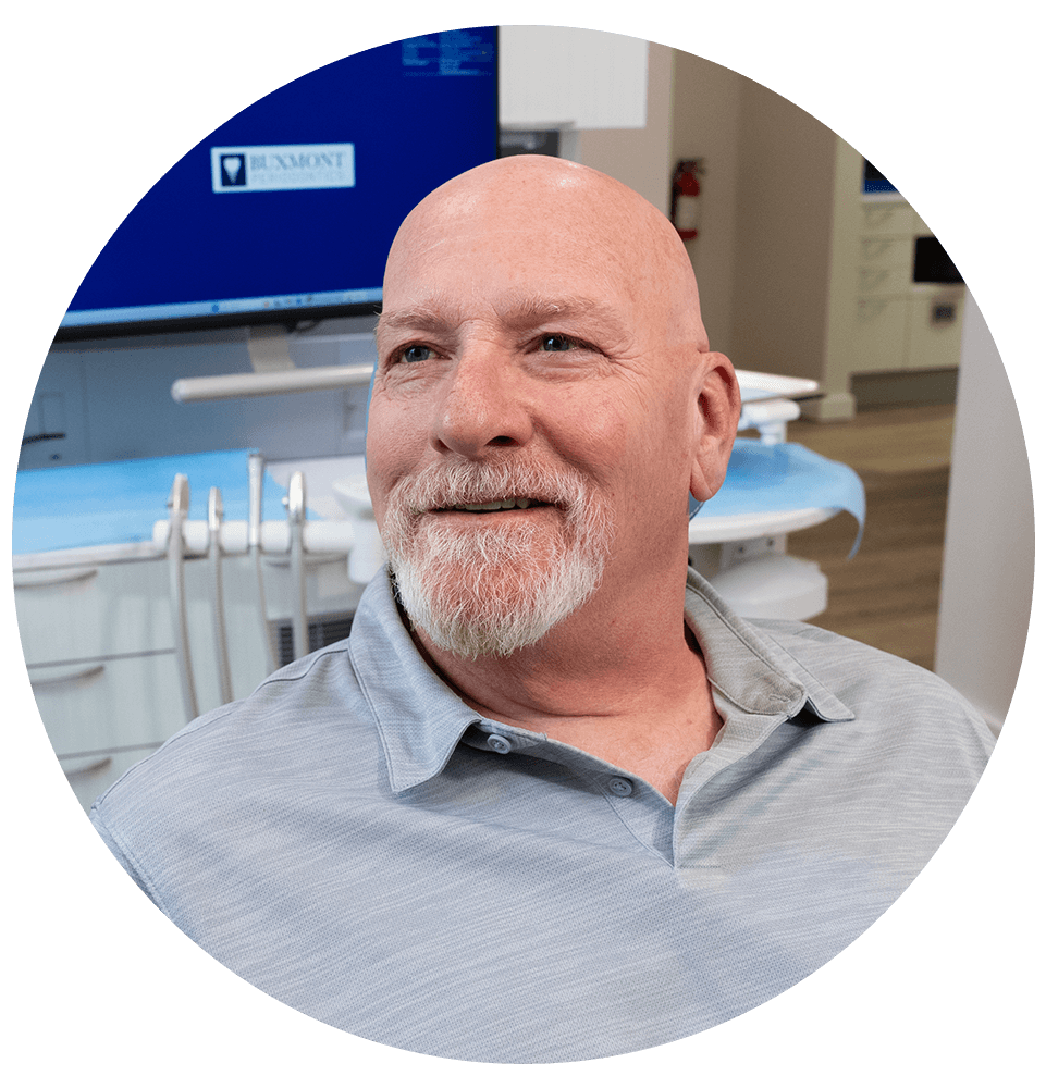 patient smiling and prep and ready for dental treatment