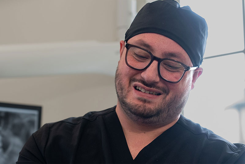close up of doctor examining dental patient for their treatment
