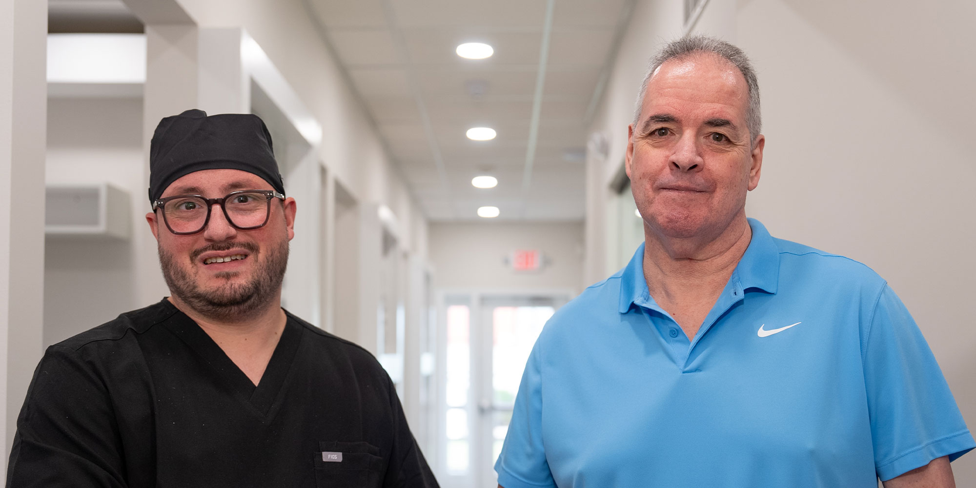patient and doctor shaking hands after dental treatment