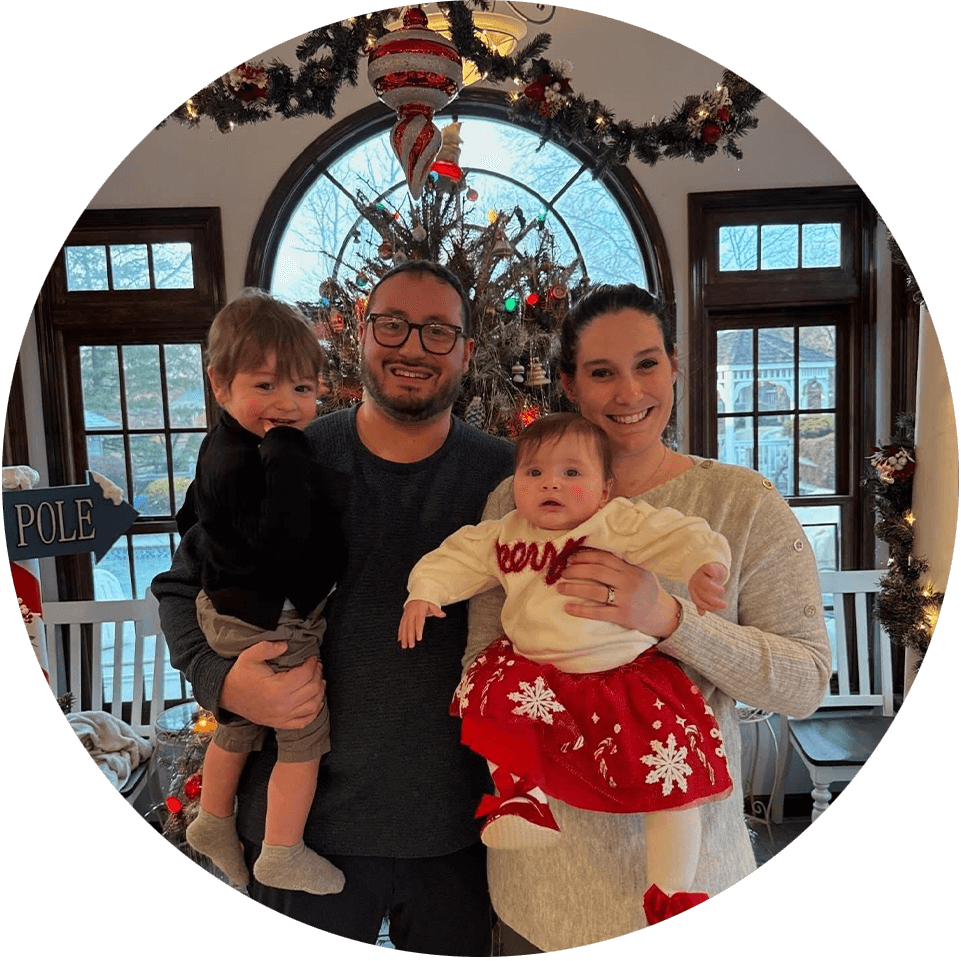 Headshot of doctor with his family